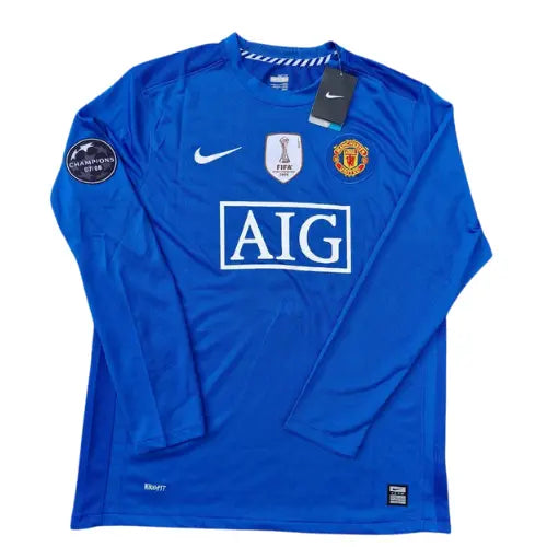 camisa manchester united retrô 2008, manga longa, uniforme reserva campeão da champions, manto branco clássico, futebol inglês, torcedor

